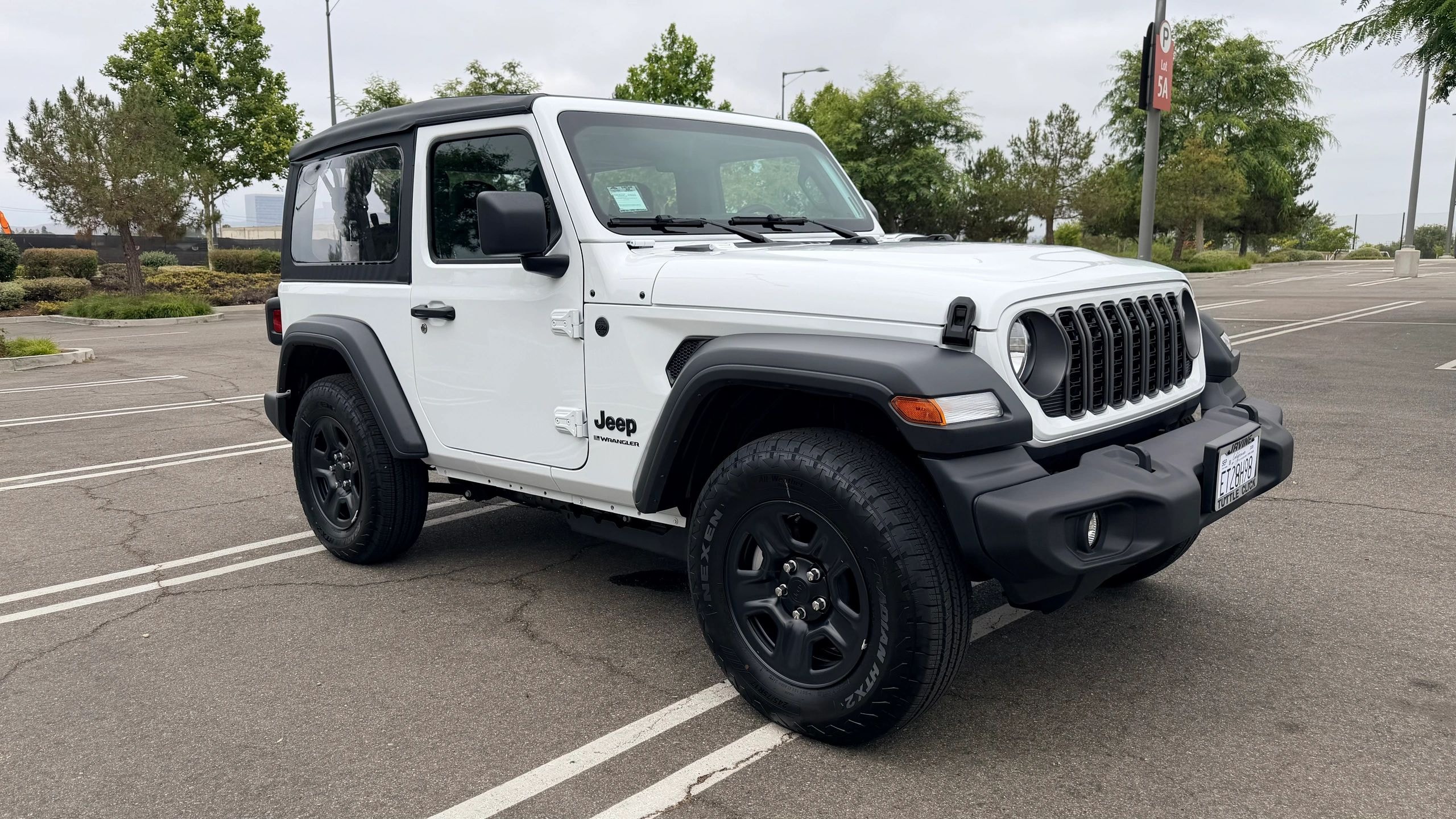 White Jeep Wrangler available for rental
