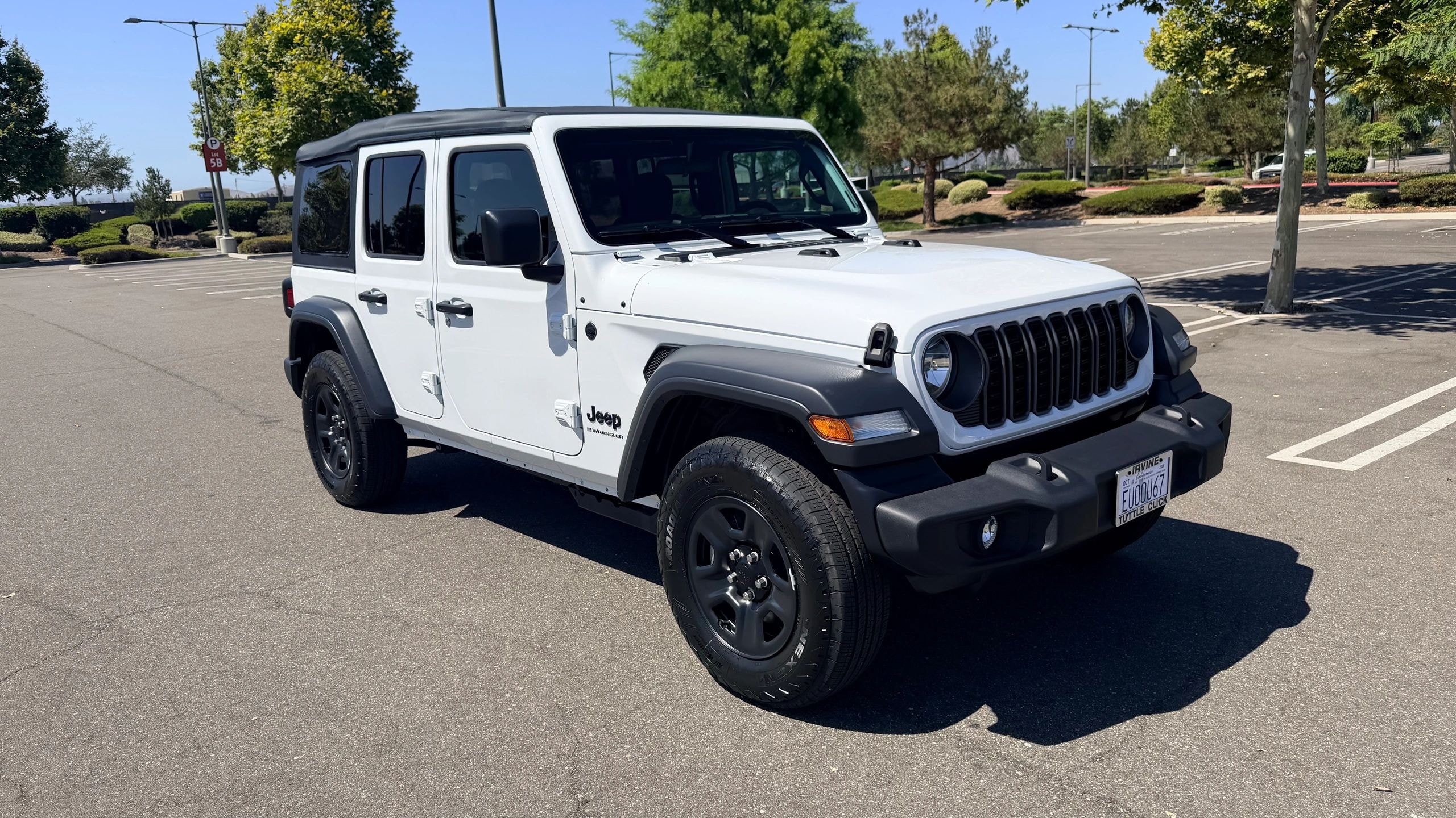 White Jeep Wrangler Unlimited available for rental